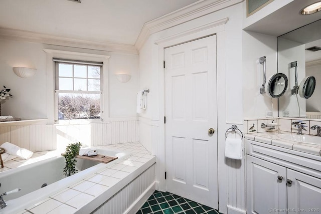 14 Great Marsh Rd, Westport, CT 06880 - full bathroom featuring wainscoting, crown molding, vanity, and a tub with jets