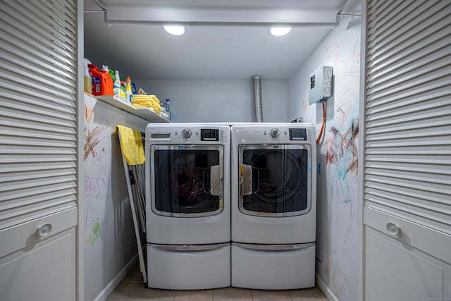 23 Hale St, Westport, CT 06880 - laundry room featuring light tile patterned floors, washing machine and dryer, and baseboards