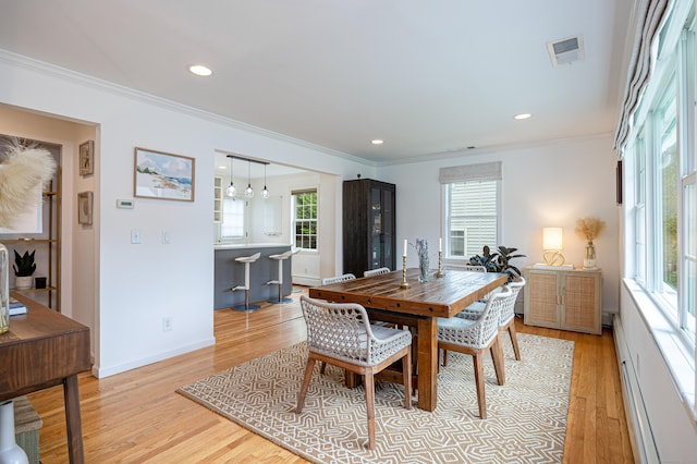 23 Hale St, Westport, CT 06880 - dining room featuring light wood-type flooring, crown molding, baseboards, recessed lighting, and a baseboard heating unit