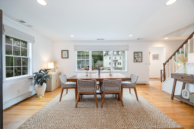 23 Hale St, Westport, CT 06880 - dining area with stairs, healthy amount of natural light, ornamental molding, wood finished floors, and a baseboard heating unit