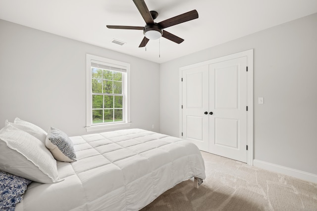 261 W St, Hebron, CT 06248 - carpeted bedroom featuring baseboards, a closet, and ceiling fan