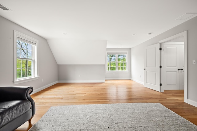 261 W St, Hebron, CT 06248 - unfurnished room with light wood-type flooring, baseboards, and vaulted ceiling