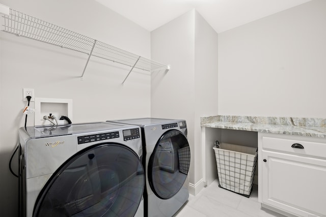 261 W St, Hebron, CT 06248 - laundry area featuring independent washer and dryer and cabinet space