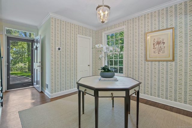 49 Dogwood Ln, New Canaan, CT 06840 - dining space featuring wood finished floors, baseboards, ornamental molding, and plenty of natural light
