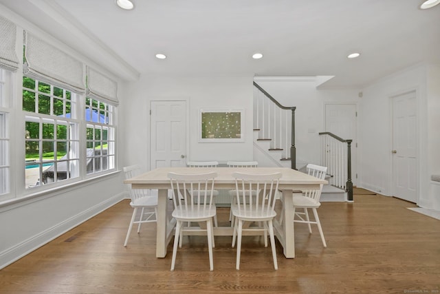 49 Dogwood Ln, New Canaan, CT 06840 - dining space with stairs, wood finished floors, baseboards, and recessed lighting