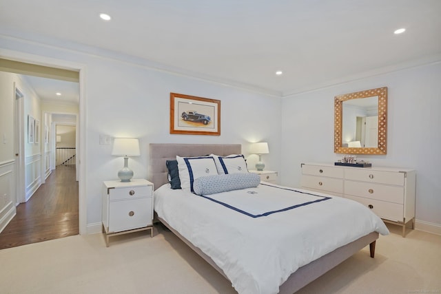 49 Dogwood Ln, New Canaan, CT 06840 - bedroom featuring crown molding, recessed lighting, baseboards, light wood-style floors, and light carpet