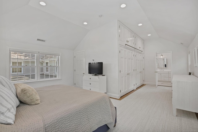 49 Dogwood Ln, New Canaan, CT 06840 - bedroom with vaulted ceiling, recessed lighting, baseboards, and ensuite bath