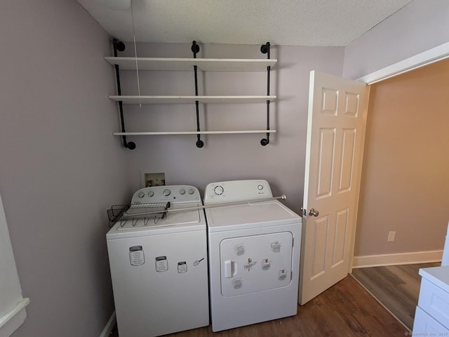 386 Platt Ave, West Haven, CT 06516 - laundry area featuring independent washer and dryer, dark wood finished floors, and baseboards