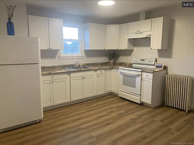386 Platt Ave, West Haven, CT 06516 - kitchen featuring white appliances, radiator heating unit, under cabinet range hood, a sink, and white cabinets