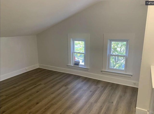 386 Platt Ave, West Haven, CT 06516 - additional living space featuring vaulted ceiling, dark wood finished floors, and baseboards