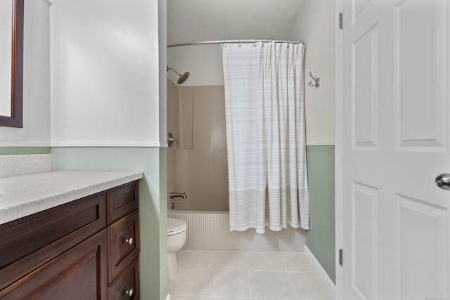 bathroom with shower / bath combination with curtain, vanity, toilet, and tile patterned flooring