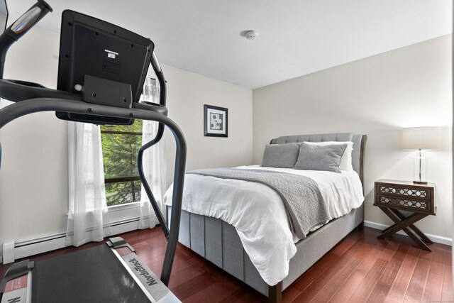 bedroom with wood finished floors