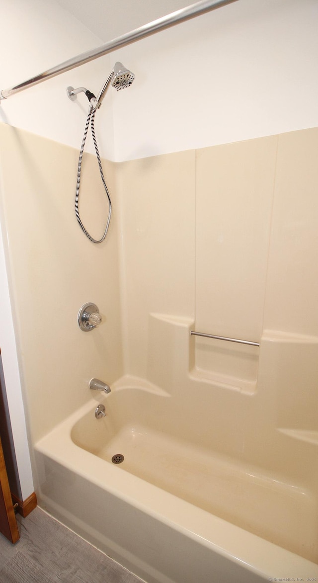 full bathroom featuring  shower combination