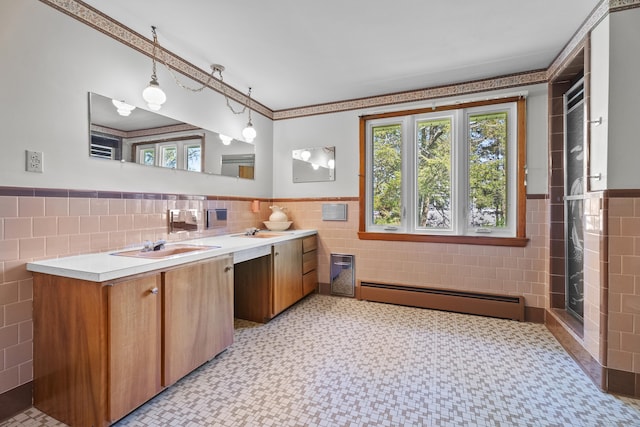 241 Clarks Falls Rd, North Stonington, CT 06359 - full bath featuring a baseboard radiator, tile walls, a wainscoted wall, vanity, and a shower