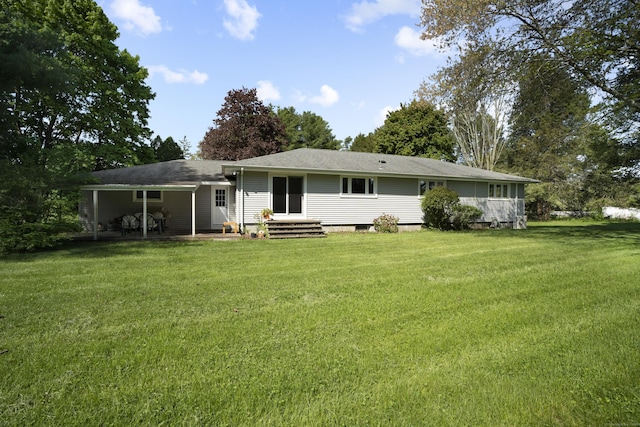 241 Clarks Falls Rd, North Stonington, CT 06359 - back of house with a lawn and roof with shingles