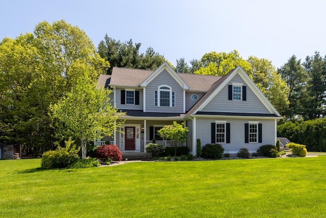 123 Cobblestone Dr, Southington, CT 06479 - view of front of property with a front yard, covered porch, and a shingled roof