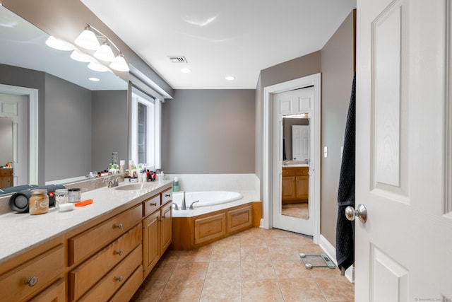123 Cobblestone Dr, Southington, CT 06479 - bathroom featuring vanity, a bath, and tile patterned flooring