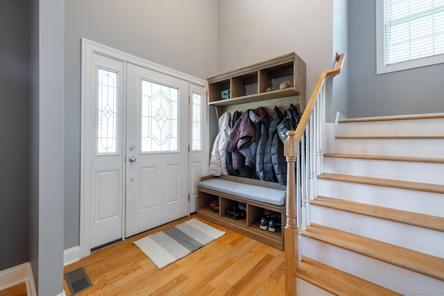 123 Cobblestone Dr, Southington, CT 06479 - mudroom featuring wood finished floors and a high ceiling