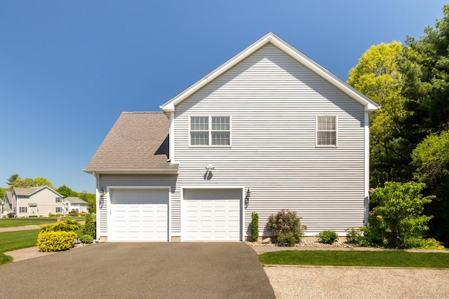 123 Cobblestone Dr, Southington, CT 06479 - view of property exterior with driveway and an attached garage