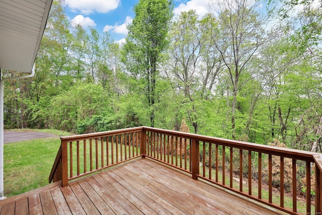 deck featuring a lawn