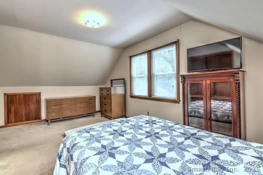 32 Lenox Ave, Norwalk, CT 06854 - carpeted bedroom with lofted ceiling