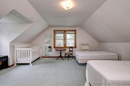 32 Lenox Ave, Norwalk, CT 06854 - carpeted bedroom with lofted ceiling