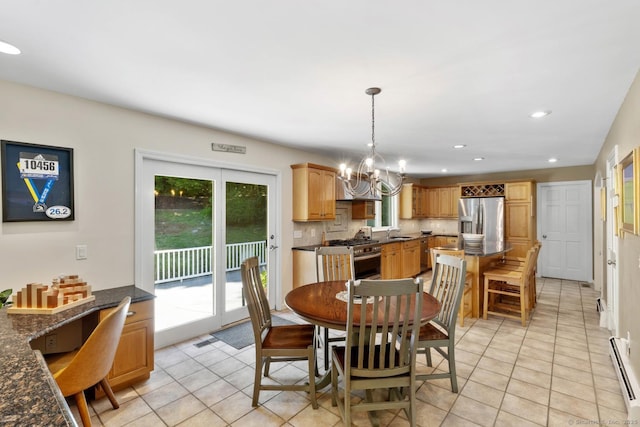 15 Westwood Rd, Essex, CT 06442 - dining space featuring light tile patterned floors, a baseboard radiator, a chandelier, and recessed lighting