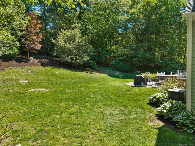15 Westwood Rd, Essex, CT 06442 - view of green lawn with a patio area and central AC unit