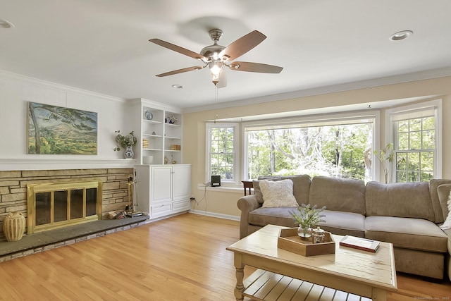 95 Vista Rd, Wilton, CT 06897 - living room featuring light wood-style floors, ornamental molding, ceiling fan, a fireplace, and baseboards