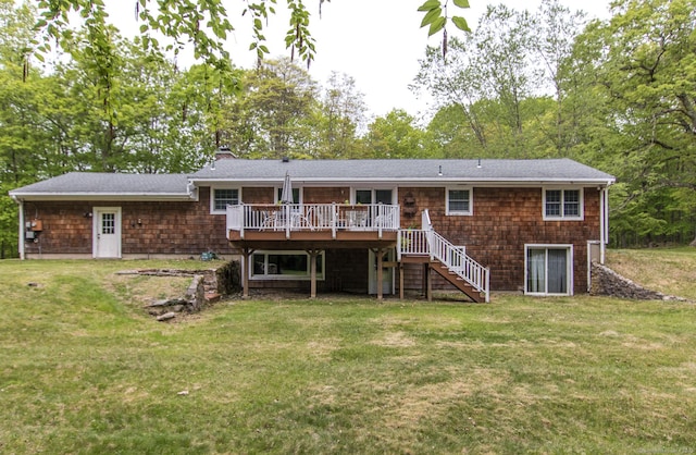 95 Vista Rd, Wilton, CT 06897 - rear view of house with a deck, stairway, a chimney, a lawn, and view of scattered trees
