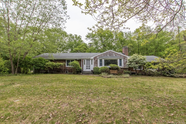95 Vista Rd, Wilton, CT 06897 - single story home with a chimney and a front lawn