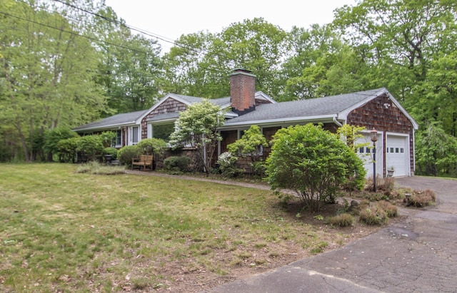95 Vista Rd, Wilton, CT 06897 - view of front facade featuring a chimney, asphalt driveway, a front lawn, an attached garage, and roof with shingles