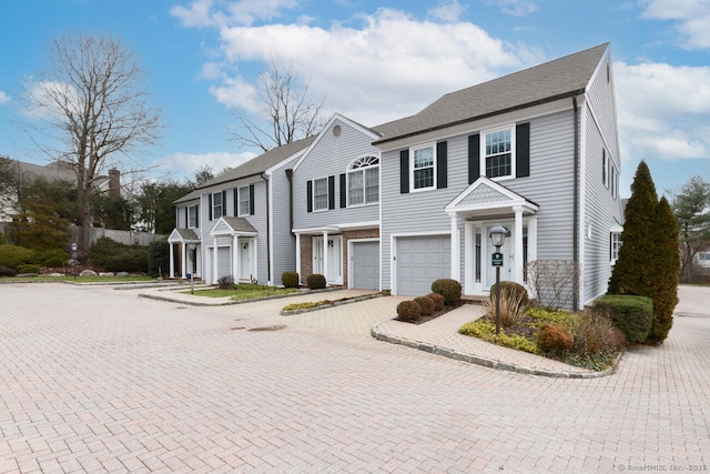 11 Norman Ln, Darien, CT 06820 - view of front of house with driveway and an attached garage