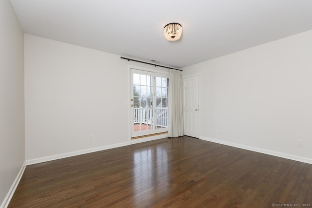 11 Norman Ln, Darien, CT 06820 - unfurnished room featuring dark wood finished floors and baseboards