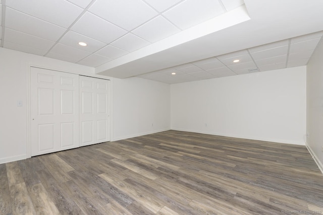 11 Norman Ln, Darien, CT 06820 - unfurnished bedroom featuring a paneled ceiling, wood finished floors, recessed lighting, and a closet