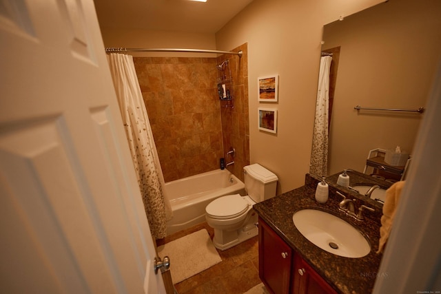 full bathroom featuring vanity, tile patterned floors, toilet, and shower / bath combo with shower curtain