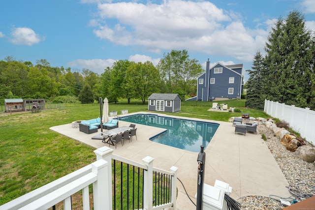 917 N Grand St, Suffield, CT 06093 - view of pool with outdoor lounge area, a patio area, and an outbuilding
