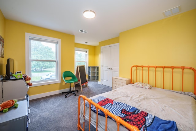 917 N Grand St, Suffield, CT 06093 - carpeted bedroom featuring baseboards and a closet