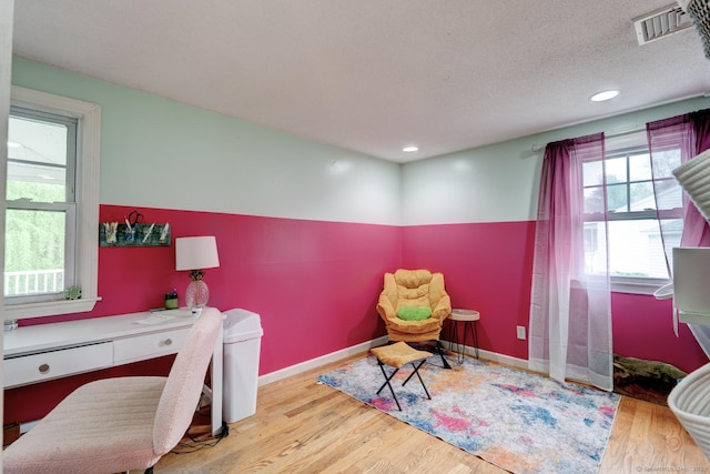 office with wood finished floors, recessed lighting, and baseboards