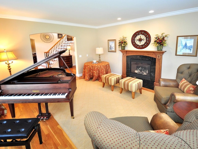 21 Pheasant Hill Rd, Canton, CT 06019 - living room featuring wood finished floors, stairs, a premium fireplace, ornamental molding, and recessed lighting