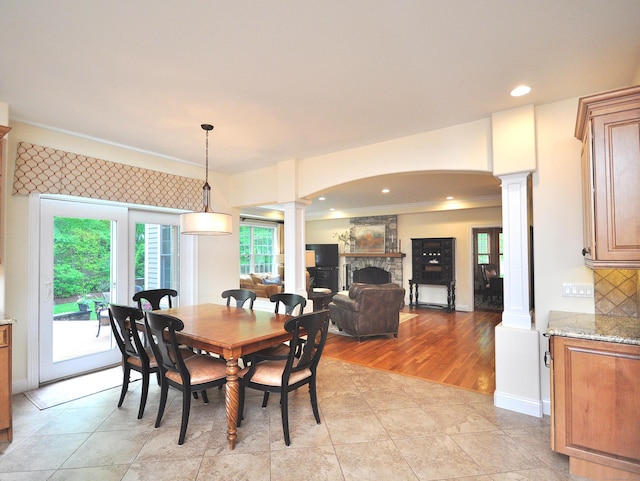 21 Pheasant Hill Rd, Canton, CT 06019 - dining area with ornate columns, a stone fireplace, recessed lighting, baseboards, and arched walkways