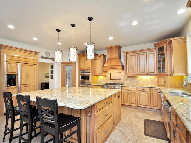 21 Pheasant Hill Rd, Canton, CT 06019 - kitchen with a sink, custom exhaust hood, stainless steel appliances, a center island with sink, and tasteful backsplash