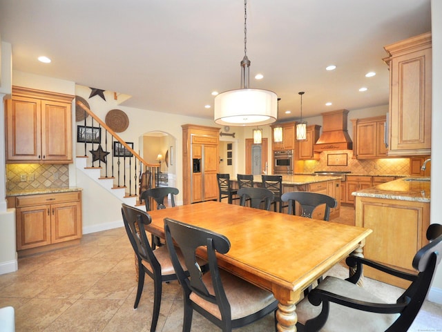 21 Pheasant Hill Rd, Canton, CT 06019 - dining space featuring recessed lighting, arched walkways, baseboards, stairway, and light tile patterned floors