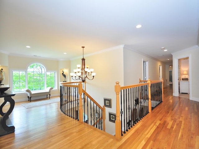 21 Pheasant Hill Rd, Canton, CT 06019 - hall with an upstairs landing, wood finished floors, recessed lighting, a chandelier, and baseboards