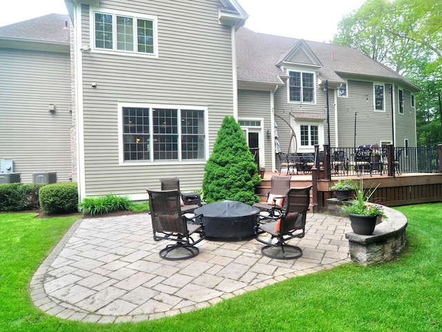 21 Pheasant Hill Rd, Canton, CT 06019 - rear view of house featuring a fire pit, a wooden deck, a patio, a yard, and a shingled roof