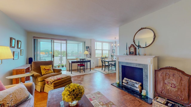 living area featuring a chandelier