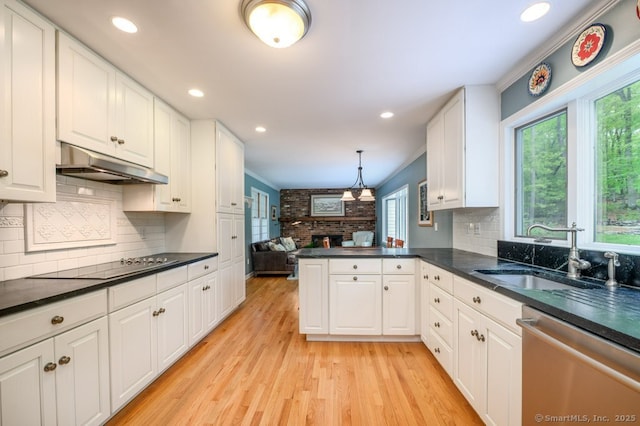 7 Indian Trl, Woodbridge, CT 06525 - kitchen with under cabinet range hood, dishwasher, a sink, black electric stovetop, and dark countertops