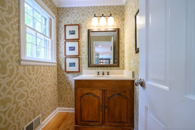 7 Indian Trl, Woodbridge, CT 06525 - bathroom featuring wallpapered walls, wood finished floors, vanity, crown molding, and baseboards