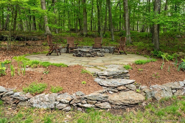 7 Indian Trl, Woodbridge, CT 06525 - view of yard featuring an outdoor fire pit and a patio area