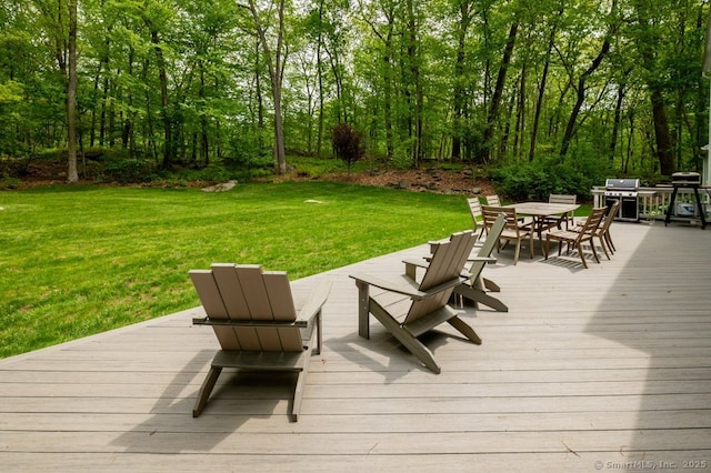 7 Indian Trl, Woodbridge, CT 06525 - wooden deck with outdoor dining area, a yard, and grilling area
